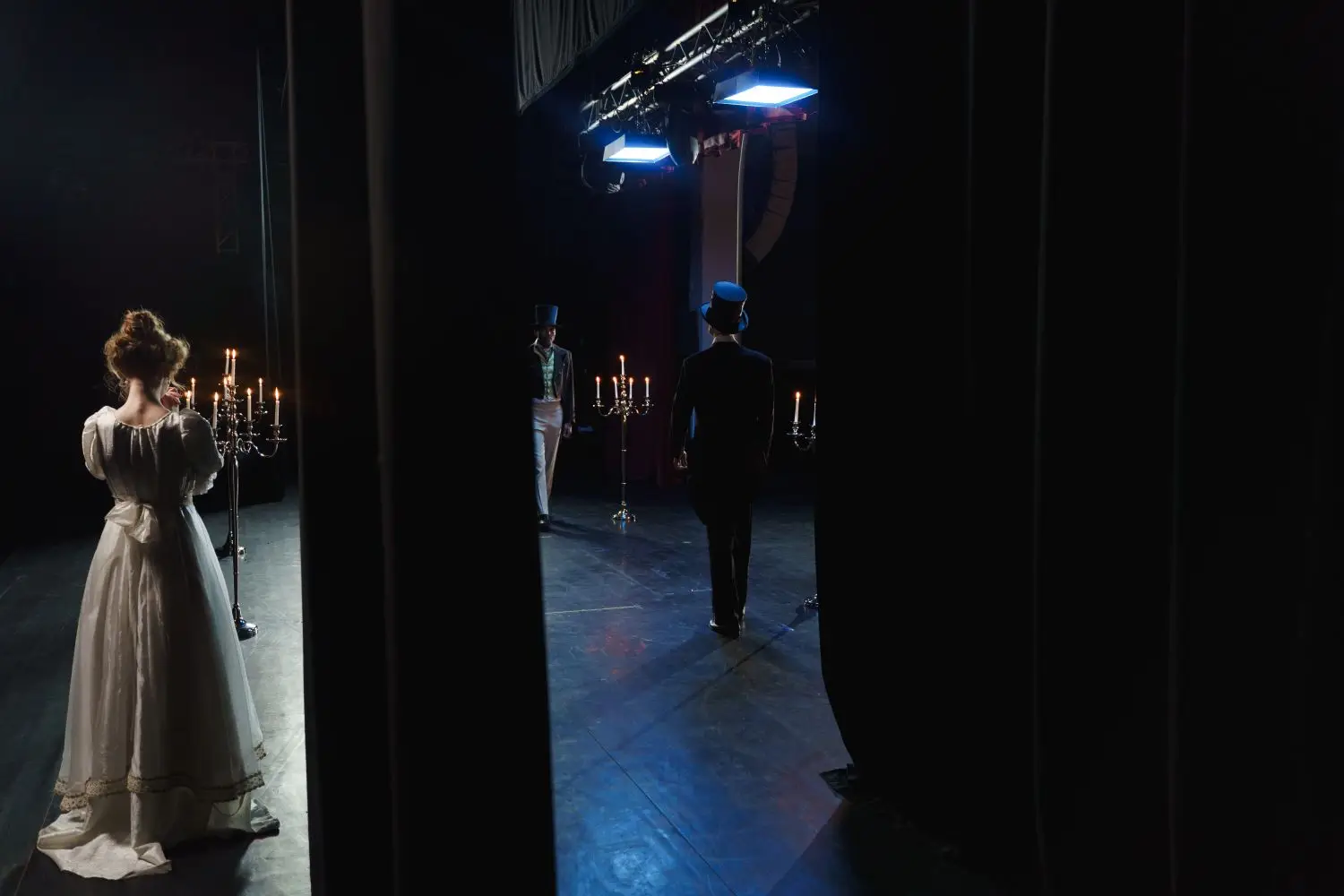 Performer waiting in the theatre wings