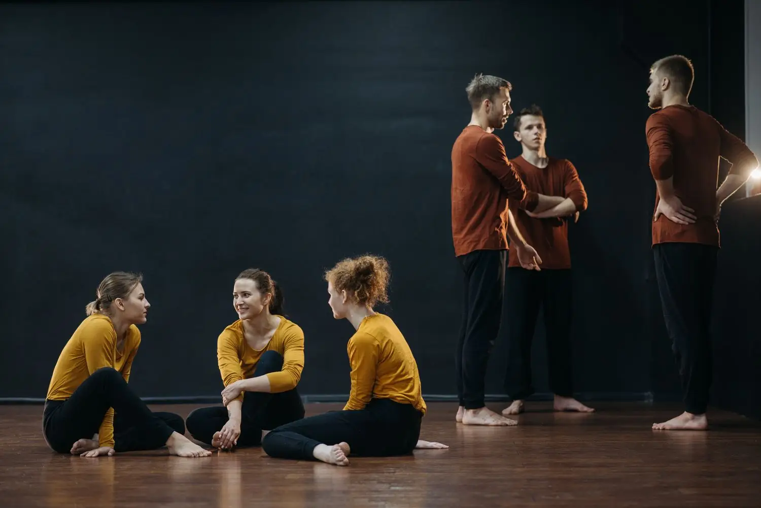 Group of actors working together in a rehearsal studio